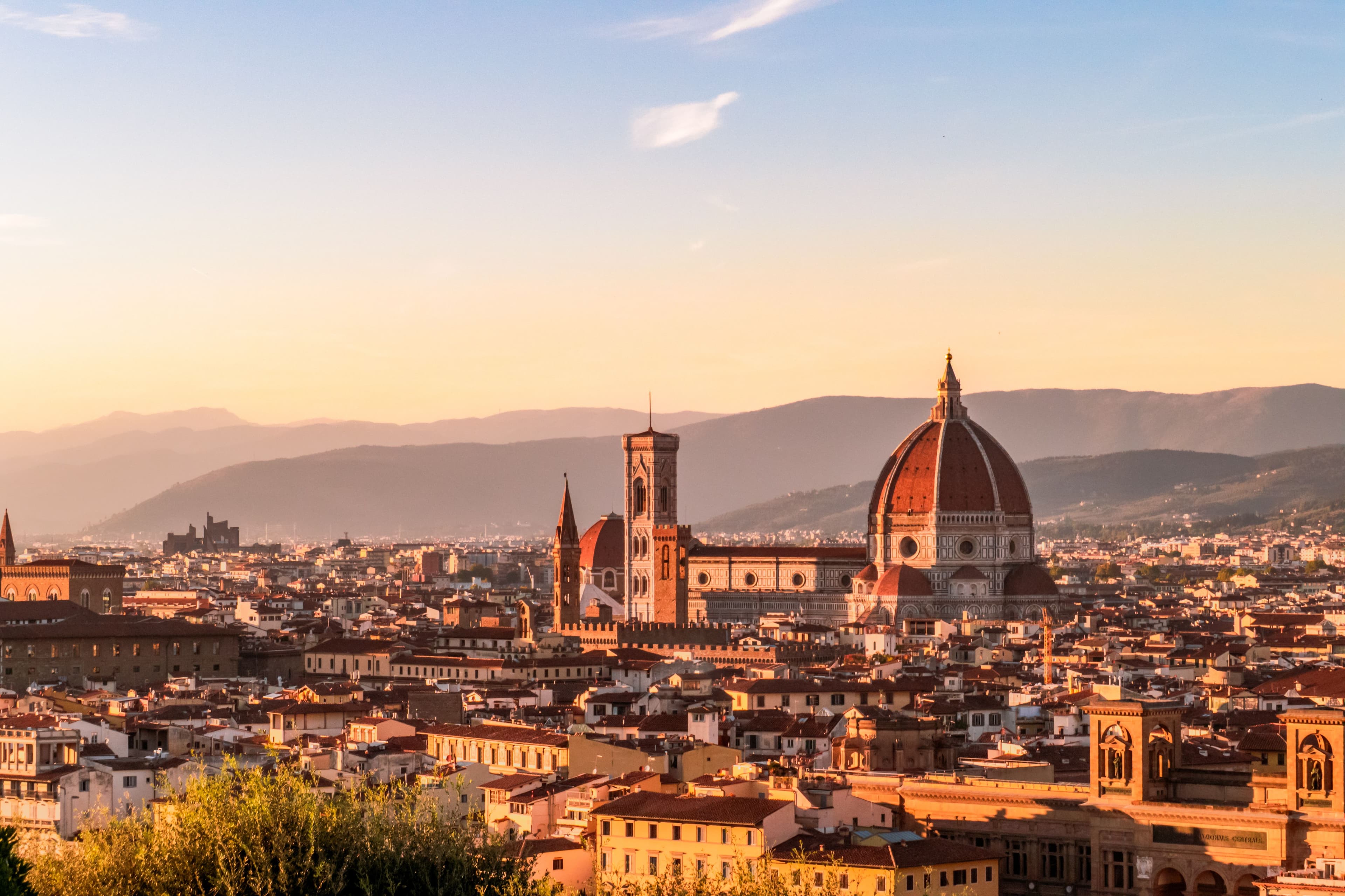 Florence skyline at sunset with the Duomo and its bell tower